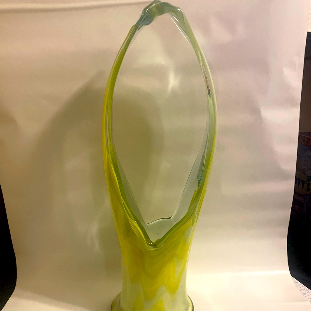 Yellow hand blown glass vase.